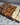 Assorted brownies on a branded paper
